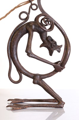 Lot 357 - A French wrought-iron 'Grotesque' table lamp