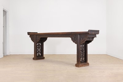 Lot 386 - A large ebonised elm altar table