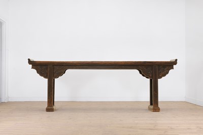 Lot 386 - A large ebonised elm altar table