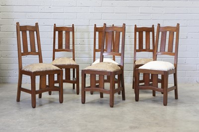 Lot 97 - A set of six Arts and Crafts oak chairs