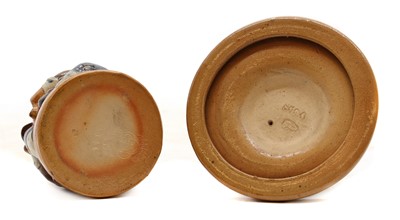 Lot 223 - A Doulton Lambeth stoneware candlestick