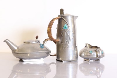 Lot 82 - A Liberty & Co. Tudric pewter part tea service