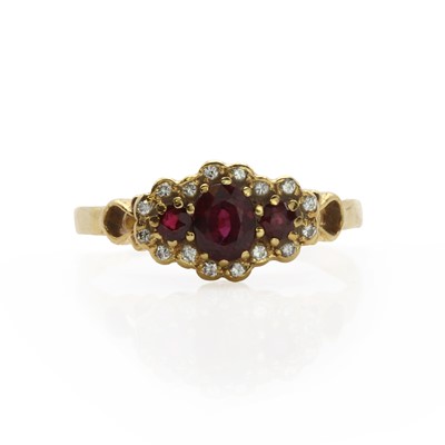 Lot 60 - An 18ct gold ruby and diamond cluster ring
