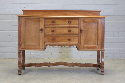 Lot 152 - An oak Heal's sideboard