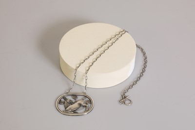 Lot 393 - A sterling silver kneeling deer necklace by Georg Jensen