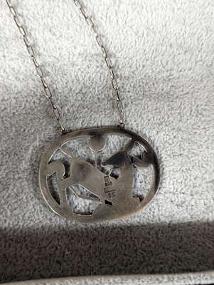 Lot 393 - A sterling silver kneeling deer necklace by Georg Jensen