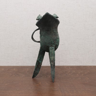 Lot 232 - A Chinese bronze 'jue' cup