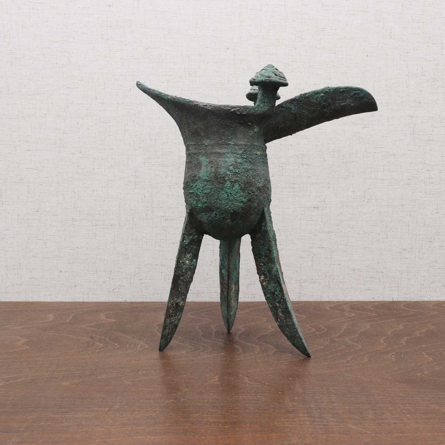 Lot 232 - A Chinese bronze 'jue' cup