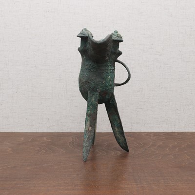 Lot 232 - A Chinese bronze 'jue' cup
