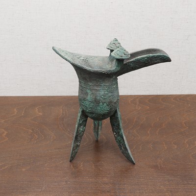 Lot 232 - A Chinese bronze 'jue' cup