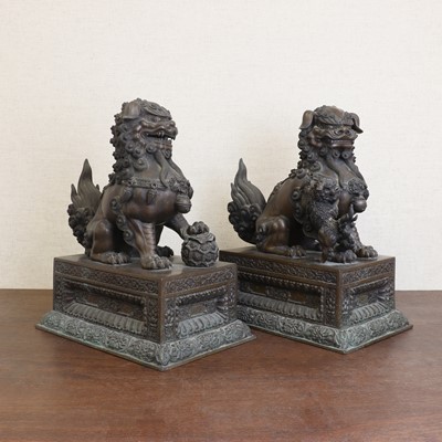 Lot 224 - A pair of Chinese bronze Buddhist lions