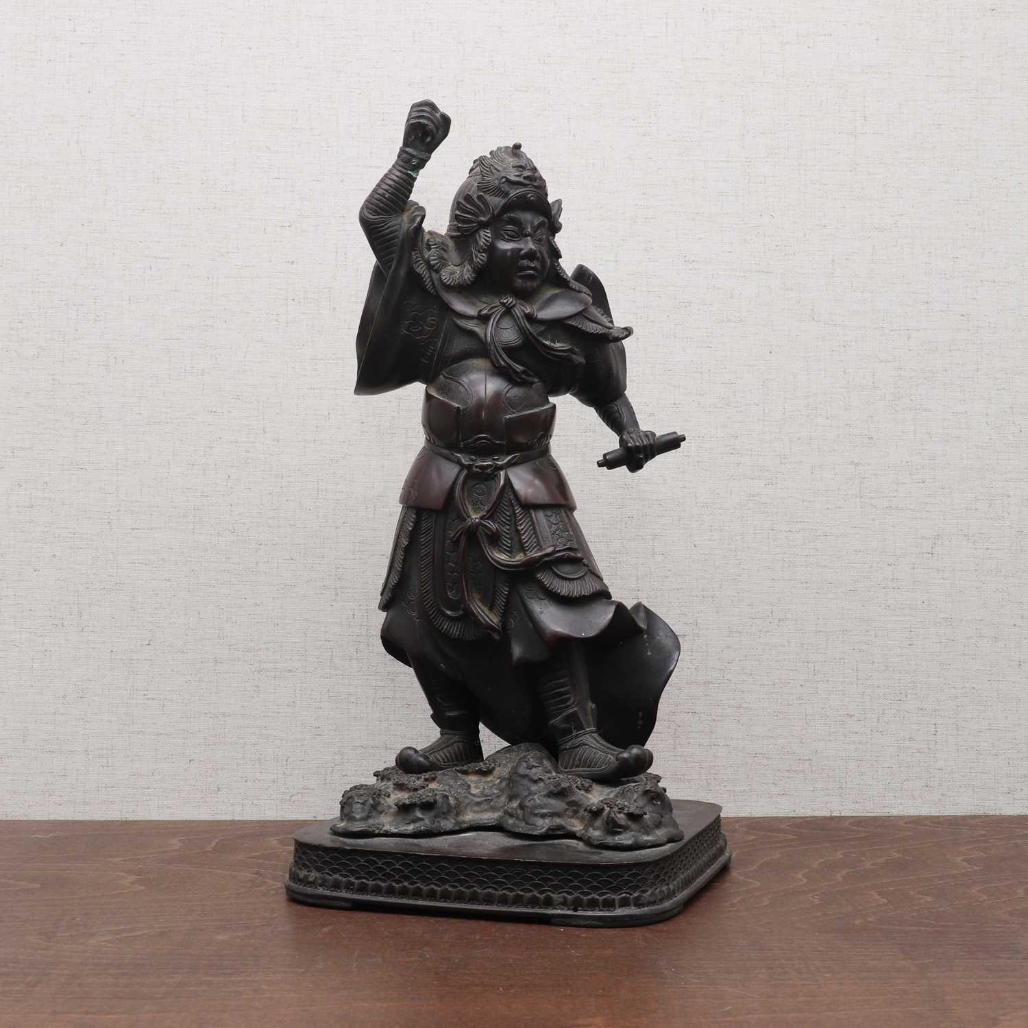 Lot 180 - A Japanese bronze okimono