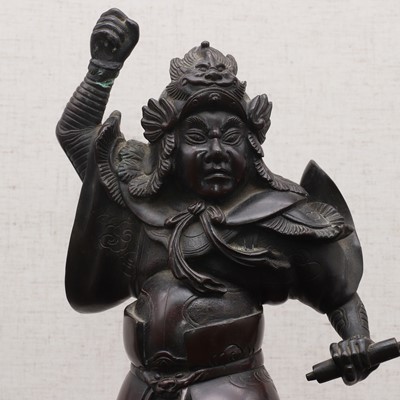 Lot 180 - A Japanese bronze okimono