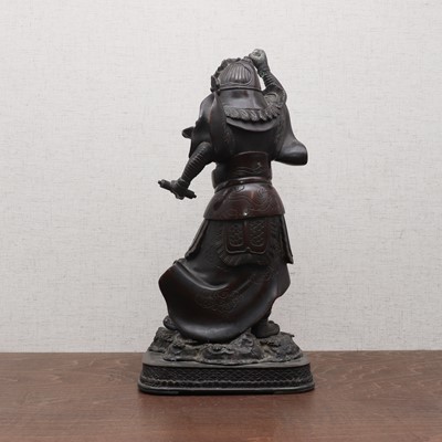 Lot 180 - A Japanese bronze okimono