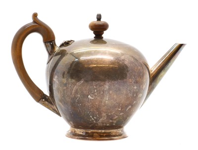 Lot 34 - A Victorian silver bullet form teapot