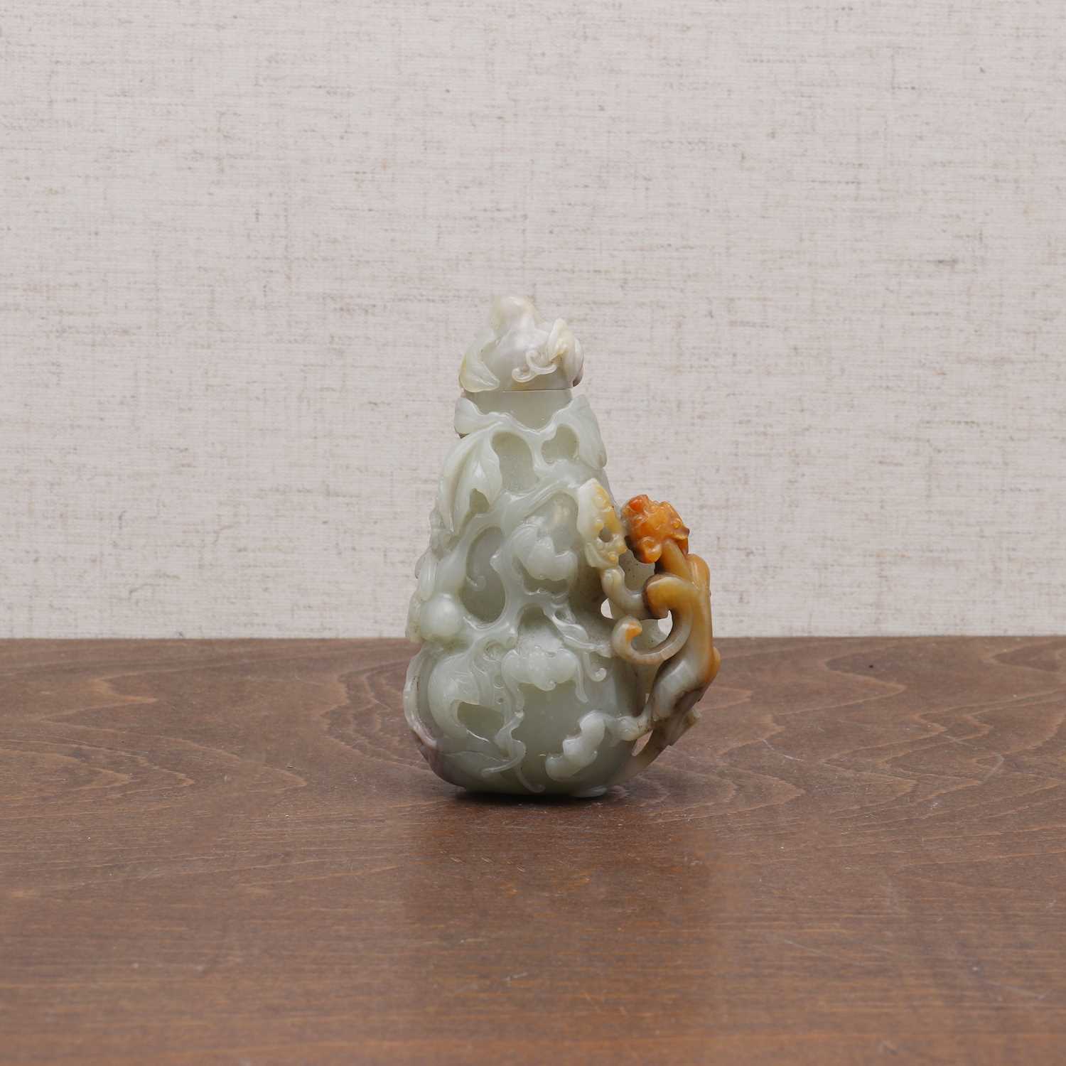 Lot 363 - A Chinese jade double gourd vase