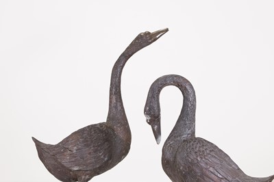 Lot 66 - A pair of patinated bronze geese