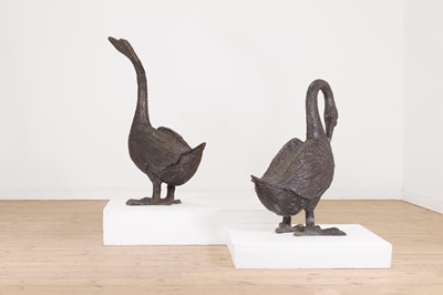 Lot 66 - A pair of patinated bronze geese