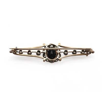 Lot 24 - A sapphire and diamond brooch