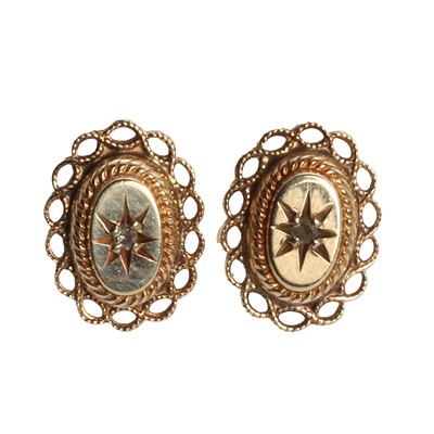 Lot 1204 - A large gold carved shell cameo brooch