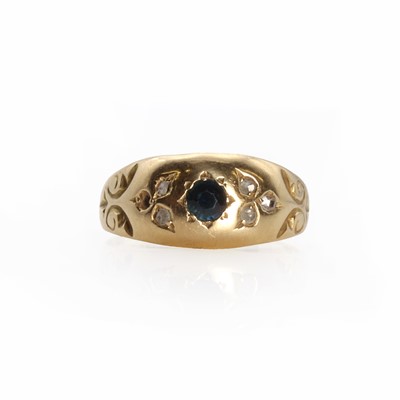 Lot 1165 - An 18ct gold sapphire and diamond ring