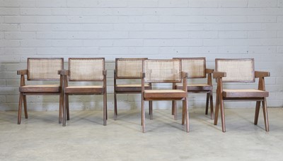 Lot 325 - A matched set of six floating-back teak armchairs