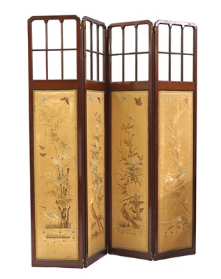 Lot 564 - An Edwardian four-fold screen with Japanese embroidery