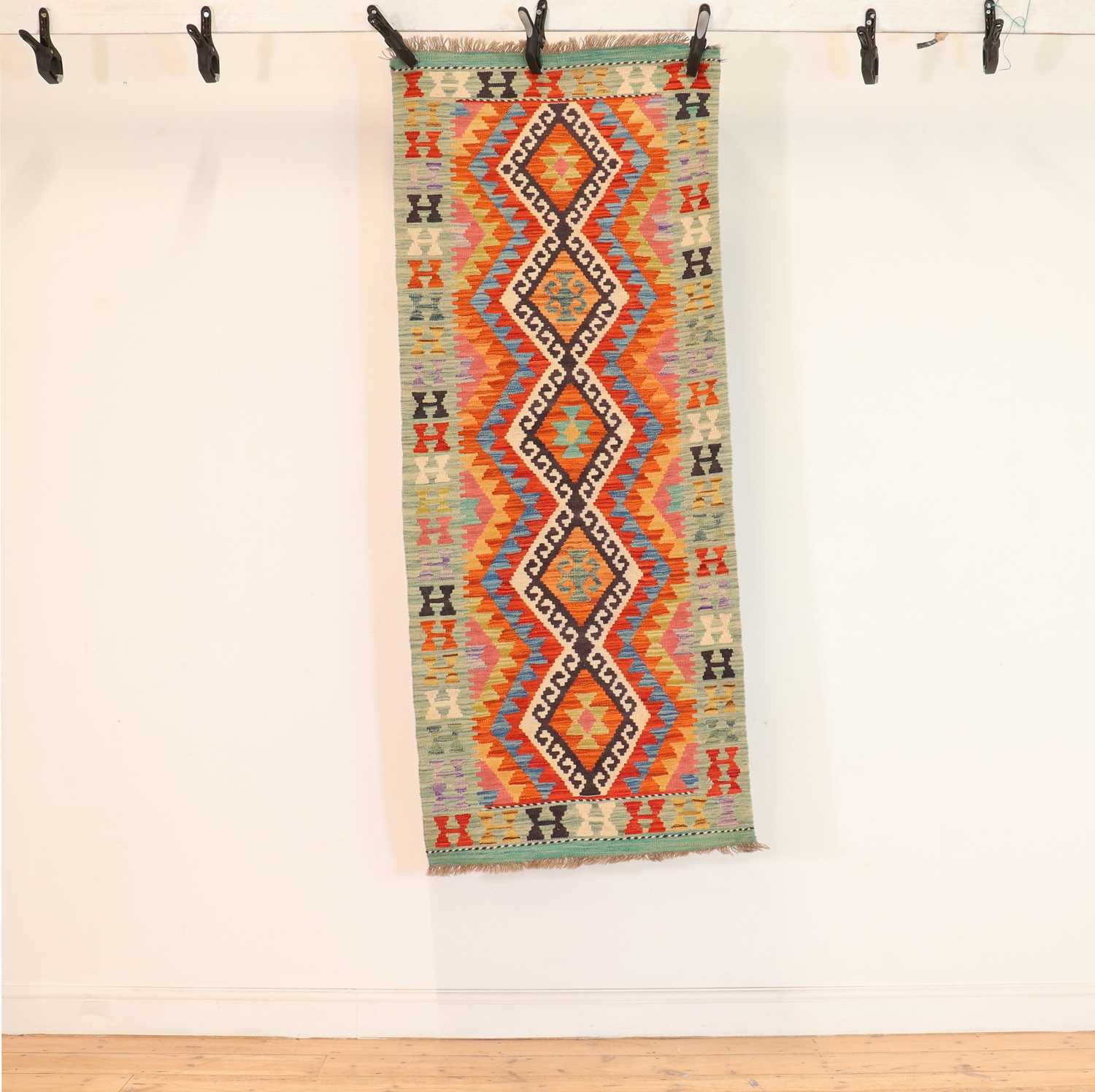 Lot 281 - A Kilim runner