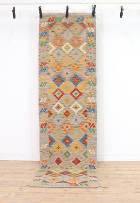 Lot 211 - A flat weave Kilim runner