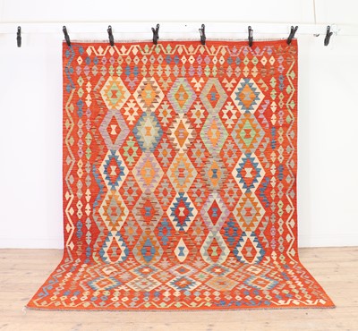 Lot 512 - A large flat weave Kilim carpet