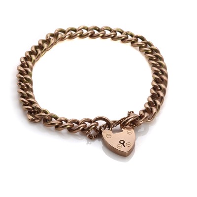 Lot 1409 - A gold curb link bracelet