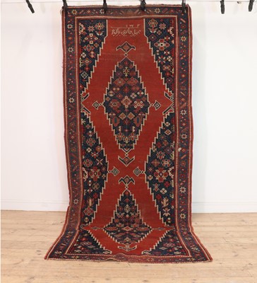 Lot 275 - A Kazak carpet
