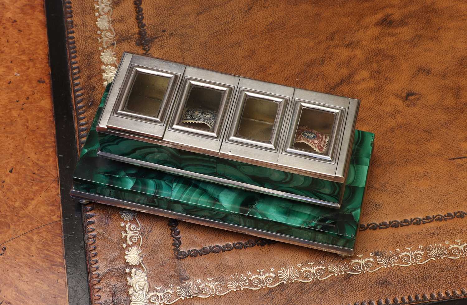 Lot 81 - A Russian silver and malachite stamp box