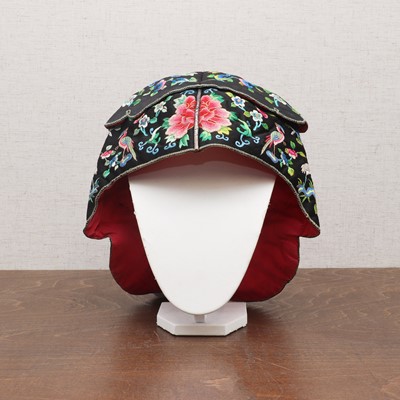 Lot 348 - A Chinese embroidered child's hat