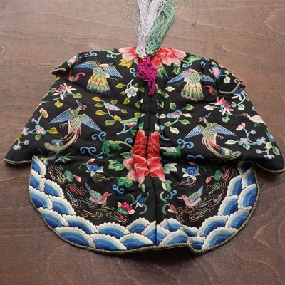 Lot 348 - A Chinese embroidered child's hat