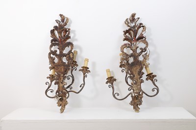 Lot 115 - A pair of carved and painted wood wall lights