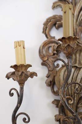 Lot 115 - A pair of carved and painted wood wall lights