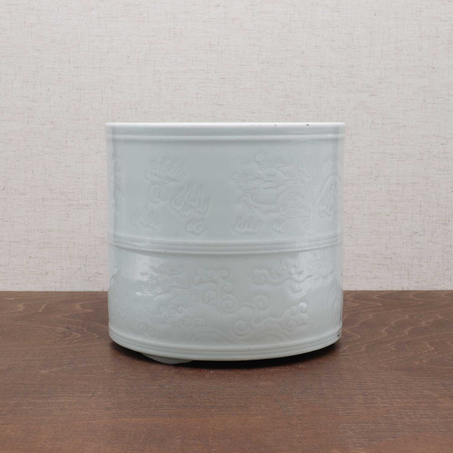 Lot 160 - A Chinese white-glazed brush pot