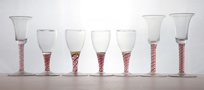 Lot 139 - A group of seven colour air twist stem glasses