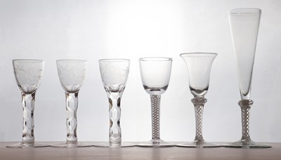 Lot 144 - A set of three 18th century facet cut wine glasses