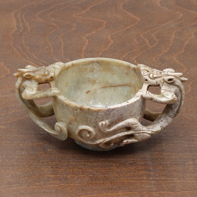 Lot 221 - A Chinese jade two-handled cup