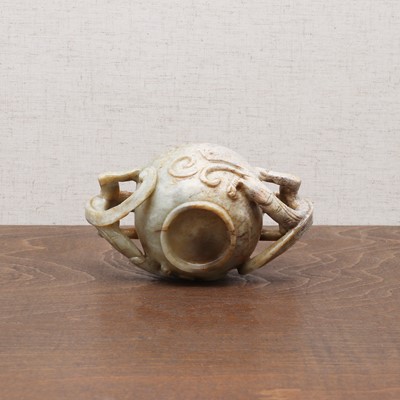 Lot 221 - A Chinese jade two-handled cup