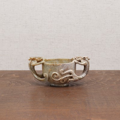 Lot 221 - A Chinese jade two-handled cup