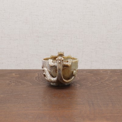 Lot 221 - A Chinese jade two-handled cup