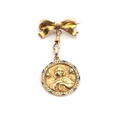 Lot 1198 - A gold enamel religious pendant