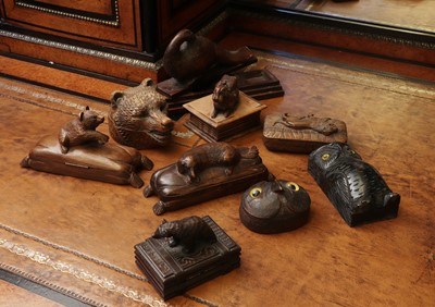 Lot 134 - A group of carved wood stamp boxes