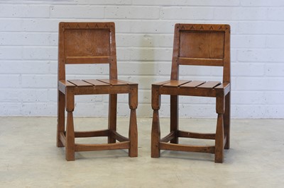 Lot 136 - A pair of Thomas 'Gnomeman' Whittaker oak side chairs