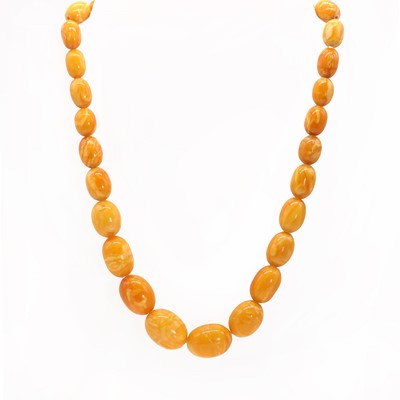 Lot 191 - A single row graduated butterscotch amber bead necklace