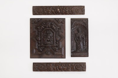 Lot 125 - A group of carved oak panels