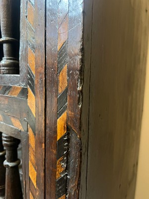 Lot 345 - A Charles I oak and inlaid ventilated livery cupboard